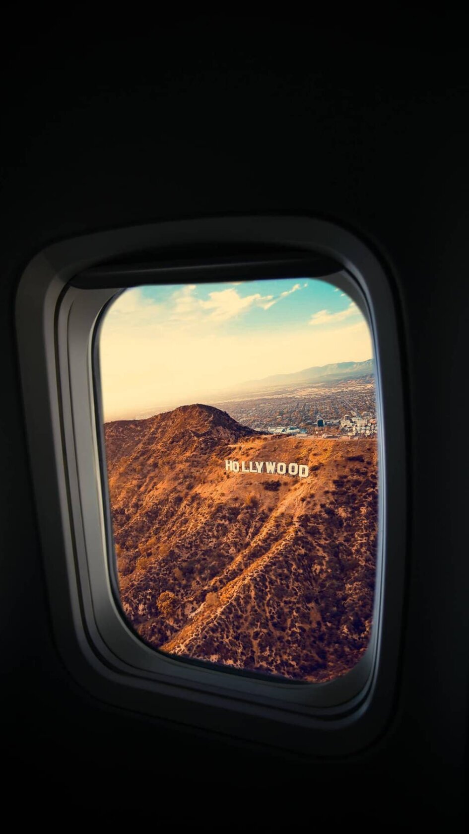 An awesome shot of the Hollywood sign from an airplane.