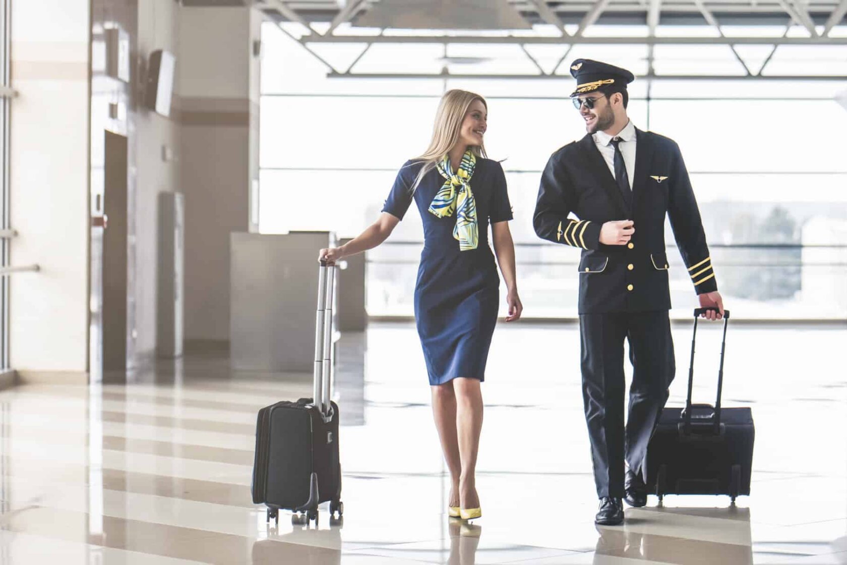 Pilot and flight attendant in airport