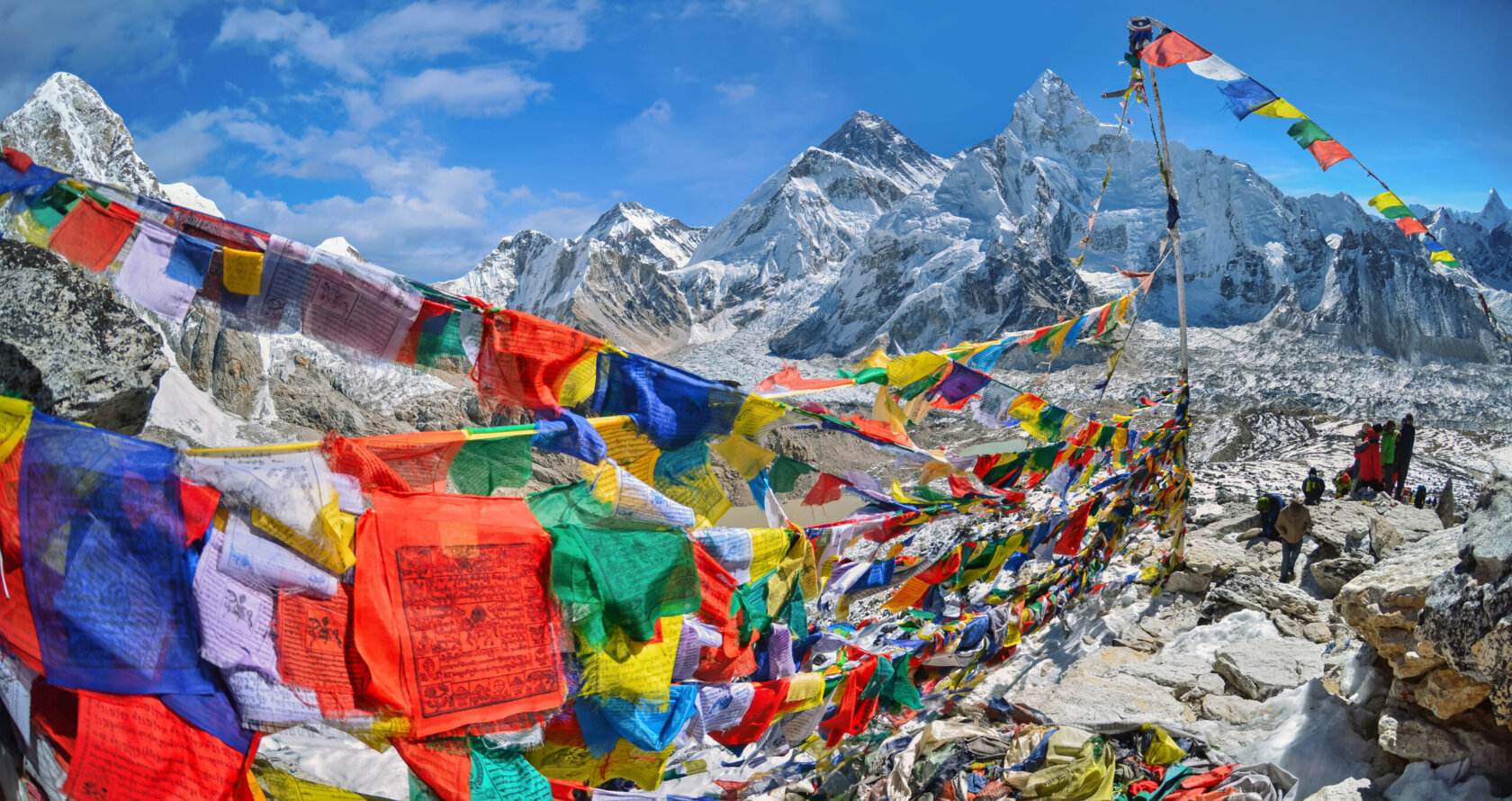 View of Mount Everest and Nuptse  with buddhist prayer flags from kala patthar in Sagarmatha National Park in the Nepal Himalaya